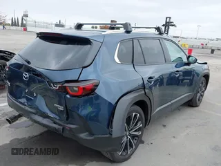 2024 Mazda CX-50 2.5 Turbo with VIN 7MMVABXY1RN237106, listed as a IAAI auction lot 42117311 with 3,135 mi miles and . Bid and sale history available at DreamBid. Image 4.