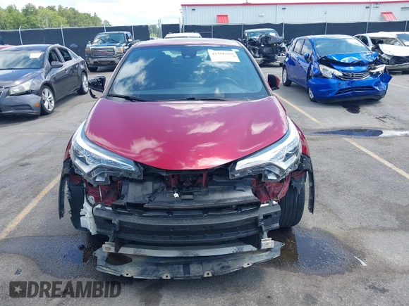 2018 Toyota C-HR XLE with VIN NMTKHMBX5JR013469, listed as a IAAI auction lot 42356609 with 32,051 mi miles and . Bid and sale history available at DreamBid. Image 13.