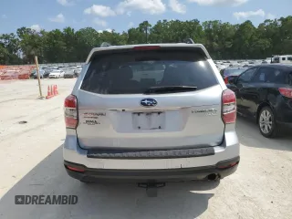 2014 Subaru Forester Touring z VIN JF2SJAMC0EH495620, wystawiony jako Copart lot #58036665 z przebiegiem 159 538 mil mil oraz Czysty tytuł • Clean title. Historia ofert i sprzedaży dostępna na DreamBid. Obrazek 6.