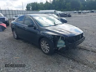 2009 Mazda 6 i Sport with VIN 1YVHP81A595M00988, listed as a IAAI auction lot 42622271 with 151,652 mi miles and . Bid and sale history available at DreamBid. Image 1.
