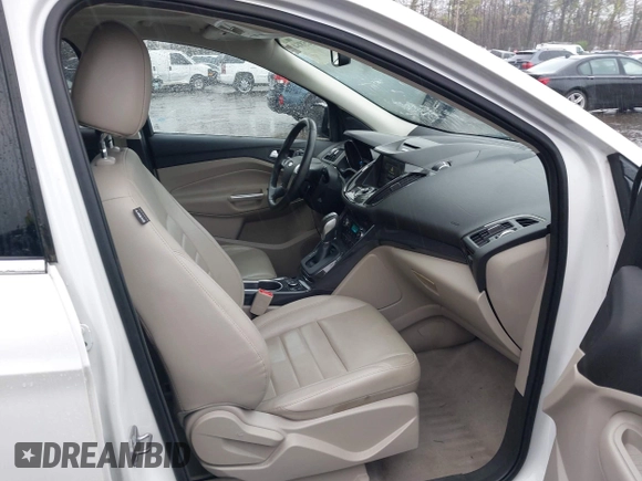 2014 Ford Escape Titanium with VIN 1FMCU9J94EUD49614, listed as a IAAI auction lot 42005864 with 87,779 mi miles. Bid and sale history available at carsss.com. Image 5.