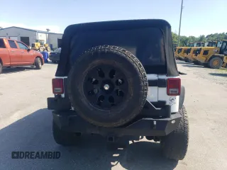 2014 Jeep Wrangler Unlimited Rubicon with VIN 1C4BJWFG4EL325544, listed as a Copart auction lot 61966025 with 149,162 mi miles and Salvage title. Bid and sale history available at DreamBid. Image 6.