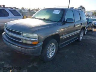 2001 Chevrolet Tahoe LT with VIN 1GNEC13T41J132352, listed as a IAAI auction lot 41490904 with 1 mi miles. Bid and sale history available at carsss.com. Image 2.