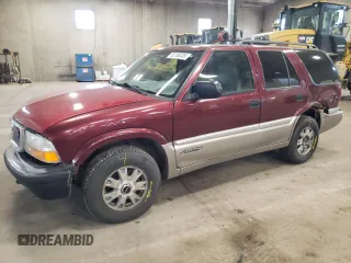 2001 GMC Jimmy SLT z VIN 1GKDT13W112191002, wystawiony jako Copart lot #55150035 z przebiegiem 203 940 mil mil oraz Nie do naprawy • Non repairable. Historia ofert i sprzedaży dostępna na DreamBid. Obrazek 1.