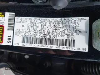 2013 Toyota Tacoma with VIN 3TMLU4EN4DM117239, listed as a IAAI auction lot 42494359 with 239,635 mi miles and . Bid and sale history available at DreamBid. Image 9.