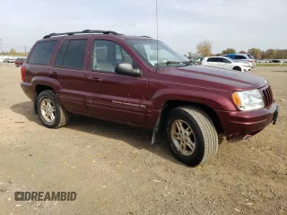 1999 Jeep Grand Cherokee Limited with VIN 1J4GW68S5XC573162, listed as a Copart auction lot 78611274 with 174,960 mi miles and Salvage Title. Bid and sale history available at carsss.com. Image 4.