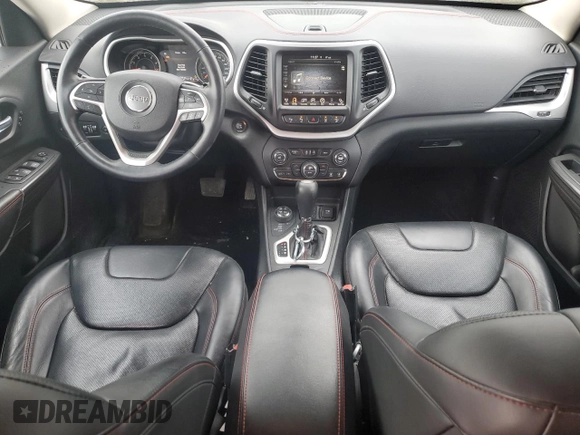 2015 Jeep Cherokee Trailhawk with VIN 1C4PJMBS0FW678738, listed as a Copart auction lot 50651235 with 147,793 mi miles and Salvage title. Bid and sale history available at DreamBid. Image 8.