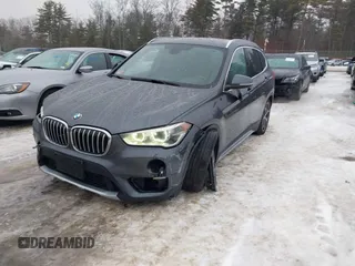 2016 BMW X1 xDrive28i with VIN WBXHT3C34GP880738, listed as a IAAI auction lot 41398105 with 113,445 mi miles and . Bid and sale history available at DreamBid. Image 12.