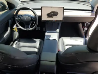 2022 Tesla Model Y Performance z VIN 7SAYGDEF2NF443037, wystawiony jako Copart lot #56870145 z przebiegiem 51 897 mil mil oraz Szkoda całkowita • Salvage title. Historia ofert i sprzedaży dostępna na DreamBid. Obrazek 8.