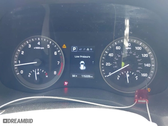 2018 Hyundai Tucson SE with VIN KM8J23A48JU646278, listed as a IAAI auction lot 41941577 with 115,228 mi miles. Bid and sale history available at carsss.com. Image 7.