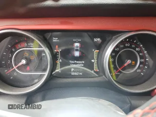 2021 Jeep Gladiator Rubicon with VIN 1C6JJTBM6ML580028, listed as a Copart auction lot 56526085 with 55,462 mi miles and Salvage title. Bid and sale history available at DreamBid. Image 9.