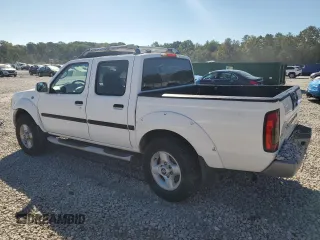 2002 Nissan Frontier SE z VIN 1N6ED27T42C319065, wystawiony jako Copart lot #74206474 z przebiegiem 147 724 mil mil oraz Szkoda całkowita • Salvage title. Historia ofert i sprzedaży dostępna na DreamBid. Obrazek 2.