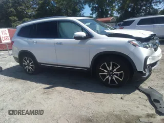 2019 Honda Pilot Touring 8-Passenger with VIN 5FNYF5H91KB038679, listed as a IAAI auction lot 40200012 with 70,582 mi miles. Bid and sale history available at carsss.com. Image 13.