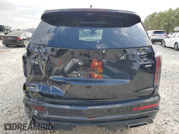 2020 Cadillac XT6 AWD Sport z VIN 1GYKPHRS1LZ209619, wystawiony jako Copart lot #43461425 z przebiegiem 65 321 mil mil oraz Szkody całkowita. Historia ofert i sprzedaży dostępna na DreamBid. Obrazek 6.