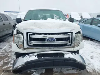 2014 Ford F-150 XL with VIN 1FTNF1CF9EKE28137, listed as a IAAI auction lot 41577971 with 180,000 mi miles. Bid and sale history available at carsss.com. Image 6.