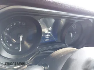 2024 Jeep Wrangler Sport S with VIN 1C4RJXN64RW141013, listed as a IAAI auction lot 42806441 with 5,893 mi miles and . Bid and sale history available at DreamBid. Image 7.