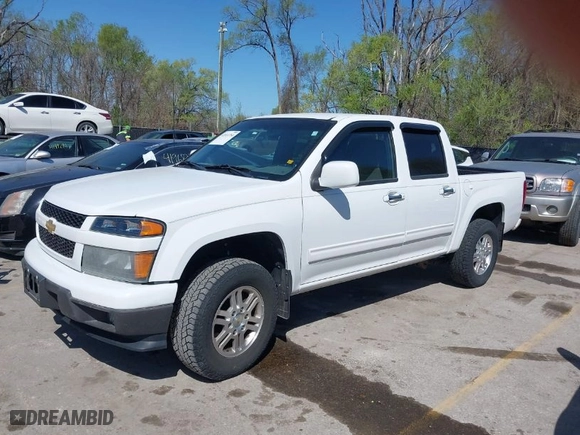 2011 Chevrolet Colorado LT w/1LT with VIN 1GCHTCFE5B8113963, listed as a IAAI auction lot 42014784 with 103,723 mi miles. Bid and sale history available at carsss.com. Image 2.