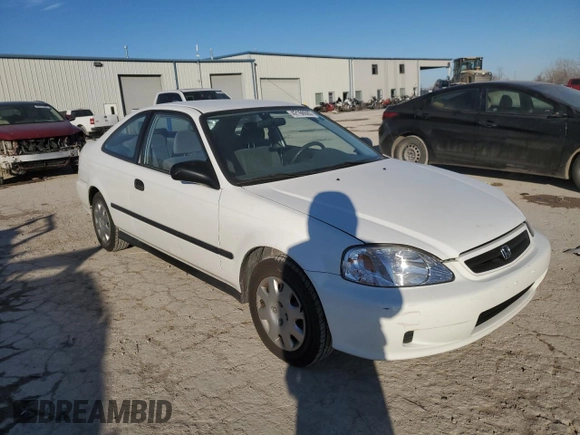 1999 Honda Civic DX with VIN 1HGEJ6120XL031958, listed as a Copart auction lot 42166565 with 69,457 mi miles and Clean Title. Bid and sale history available at carsss.com. Image 4.