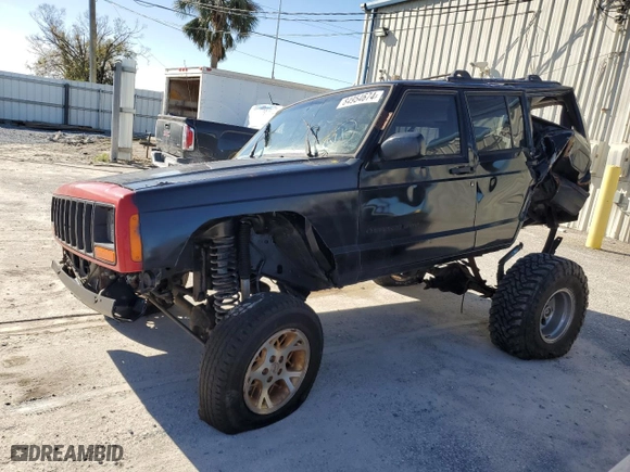 2000 Jeep Cherokee Police with VIN 1J4FF48S1YL246243, listed as a Copart auction lot 84954674 with 0 mi miles and Salvage Title. Bid and sale history available at carsss.com. Image 1.