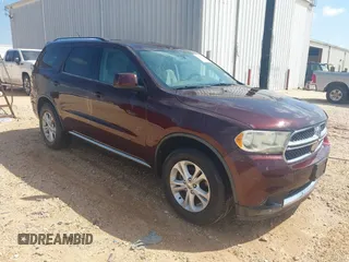 2012 Dodge Durango SXT with VIN 1C4RDHAG8CC361176, listed as a IAAI auction lot 42643631 with 201,419 mi miles and . Bid and sale history available at DreamBid. Image 1.