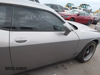 2016 Dodge Challenger SXT Plus z VIN 2C3CDZAG9GH184110, wystawiony jako IAAI lot #42463784 z przebiegiem 160 484 mil mil oraz . Historia ofert i sprzedaży dostępna na DreamBid. Obrazek 14.