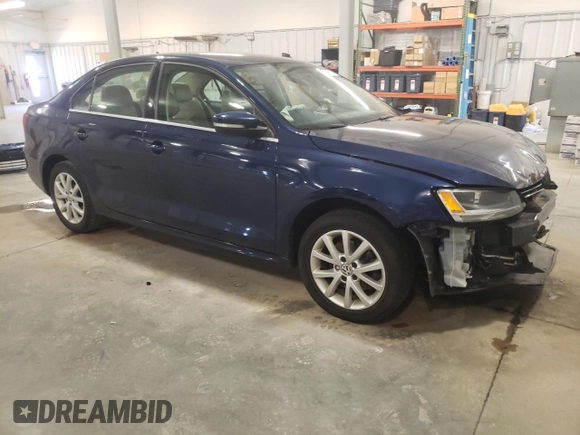 2013 Volkswagen Jetta SE with VIN 3VWDX7AJ7DM400165, listed as a Copart auction lot 55957145 with 175,668 mi miles and Salvage title. Bid and sale history available at DreamBid. Image 4.