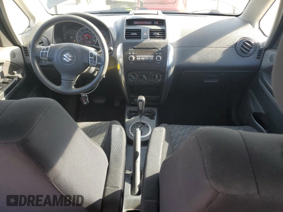 2009 Suzuki SX4 AWD z VIN JS2YB413895101919, wystawiony jako Copart lot #52235635 z przebiegiem 193 065 mil mil oraz Czysty tytuł • Clean title. Historia ofert i sprzedaży dostępna na DreamBid. Obrazek 8.