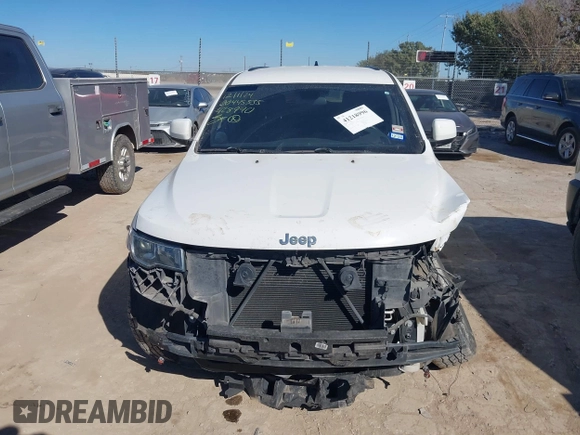 2018 Jeep Grand Cherokee Laredo E with VIN 1C4RJEAG2JC428990, listed as a IAAI auction lot 41218996 with 123,758 mi miles. Bid and sale history available at carsss.com. Image 13.