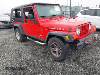 2005 Jeep Wrangler z VIN 1J4FA64S55P360542, wystawiony jako IAAI lot #41714121 z przebiegiem 204 666 mil mil oraz . Historia ofert i sprzedaży dostępna na DreamBid. Obrazek 1.