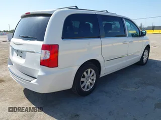 2013 Chrysler Town & Country Touring with VIN 2C4RC1BG4DR610462, listed as a IAAI auction lot 42173321 with 73,397 mi miles. Bid and sale history available at carsss.com. Image 4.