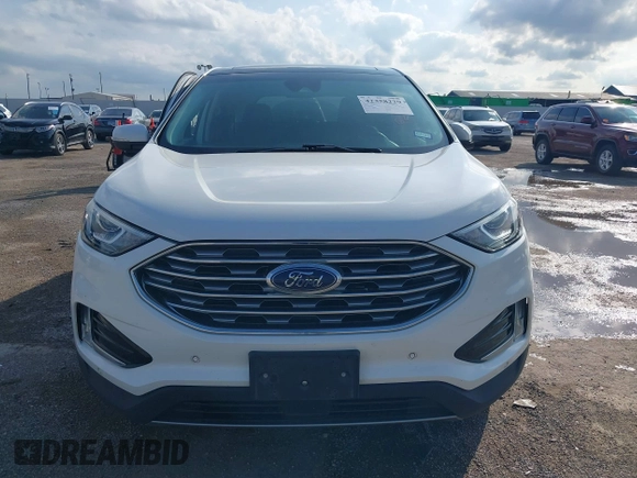 2020 Ford Edge Titanium z VIN 2FMPK3K98LBA42159, wystawiony jako IAAI lot #42358229 z przebiegiem 88 512 mil mil oraz . Historia ofert i sprzedaży dostępna na DreamBid. Obrazek 12.