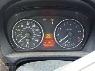 2006 BMW 3 Series 325i with VIN WBAVB13546KR57268, listed as a IAAI auction lot 42002464 with 210,663 mi miles. Bid and sale history available at carsss.com. Image 7.
