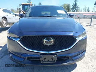 2019 Mazda CX-5 Signature with VIN JM3KFBEY7K0589236, listed as a IAAI auction lot 42078418 with 86,959 mi miles. Bid and sale history available at carsss.com. Image 12.
