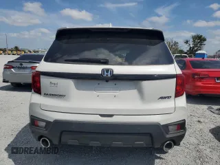 2025 Honda Passport EX-L z VIN 5FNYF8H59SB010319, wystawiony jako Copart lot #53439305 z przebiegiem 2519 mil mil oraz Szkody całkowita. Historia ofert i sprzedaży dostępna na DreamBid. Obrazek 6.