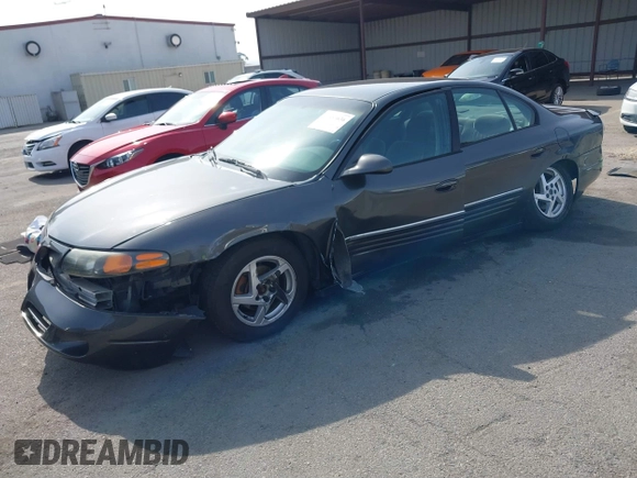 2003 Pontiac Bonneville SE z VIN 1G2HX52K934181238, wystawiony jako IAAI lot #41483636 z przebiegiem 176 737 mil mil oraz . Historia ofert i sprzedaży dostępna na DreamBid. Obrazek 2.