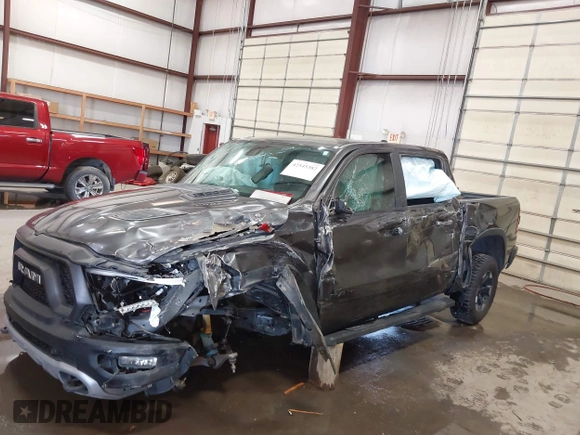 2019 Ram 1500 Rebel with VIN 1C6SRFLT2KN537313, listed as a IAAI auction lot 42545382 with Not provided miles and . Bid and sale history available at DreamBid. Image 2.