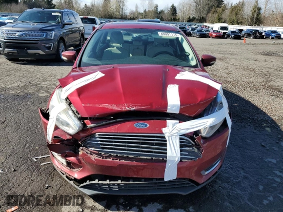 2017 Ford Focus Titanium with VIN 1FADP3N27HL287927, listed as a Copart auction lot 48057175 with 75,473 mi miles and Salvage Title. Bid and sale history available at carsss.com. Image 5.