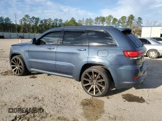 2020 Jeep Grand Cherokee Overland with VIN 1C4RJFCG8LC414033, listed as a Copart auction lot 87403024 with 55,111 mi miles and Salvage Title. Bid and sale history available at carsss.com. Image 2.