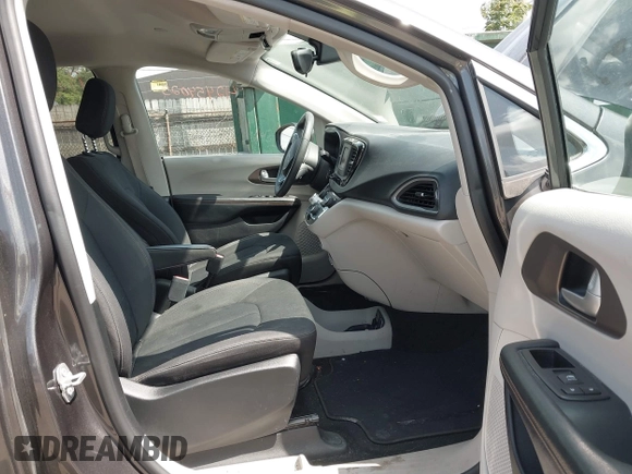 2017 Chrysler Pacifica Touring with VIN 2C4RC1DG1HR571607, listed as a IAAI auction lot 42454025 with 130,601 mi miles and . Bid and sale history available at DreamBid. Image 5.