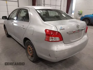 2009 Toyota Yaris with VIN JTDBT903391338448, listed as a IAAI auction lot 41583457 with 182,346 mi miles. Bid and sale history available at carsss.com. Image 3.