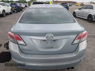 2009 Mazda 6 i Touring with VIN 1YVHP82AX95M19535, listed as a IAAI auction lot 41987285 with 129,111 mi miles and . Bid and sale history available at carsss.com. Image 17.