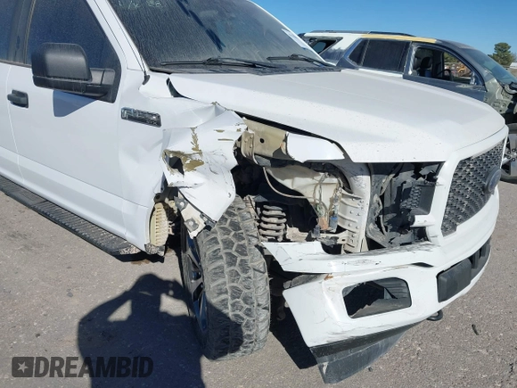 2019 Ford F-150 XL with VIN 1FTEW1EP9KKD25205, listed as a IAAI auction lot 41158627 with 179,259 mi miles and . Bid and sale history available at DreamBid. Image 6.