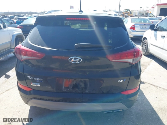 2017 Hyundai Tucson Value with VIN KM8J33A28HU302472, listed as a IAAI auction lot 41717598 with 126,438 mi miles. Bid and sale history available at carsss.com. Image 16.