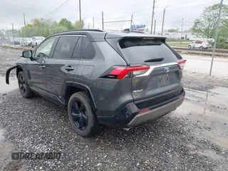 2021 Toyota RAV4 Hybrid XSE with VIN JTME6RFV0MD515817, listed as a IAAI auction lot 42127698 with 98,078 mi miles and . Bid and sale history available at DreamBid. Image 3.
