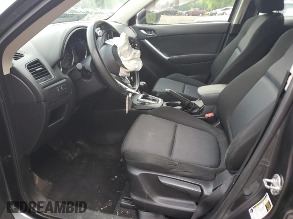 2015 Mazda CX-5 Sport with VIN JM3KE4BYXF0511249, listed as a Copart auction lot 63310695 with 208,615 mi miles and Salvage title. Bid and sale history available at DreamBid. Image 7.