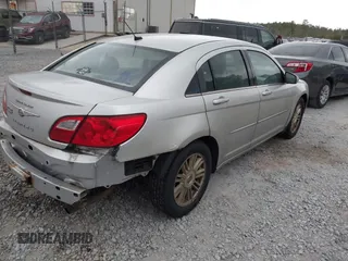 2009 Chrysler Sebring Touring with VIN 1C3LC56BX9N517563, listed as a IAAI auction lot 41853411 with 194,215 mi miles and . Bid and sale history available at DreamBid. Image 4.