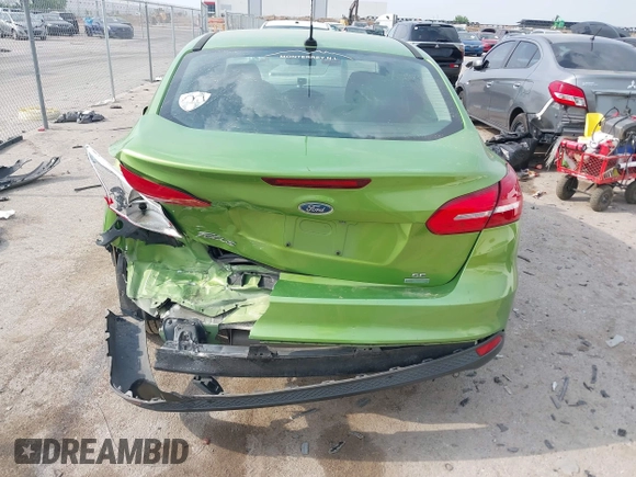 2018 Ford Focus SE z VIN 1FADP3FE5JL222542, wystawiony jako IAAI lot #42265608 z przebiegiem 107 397 mil mil oraz . Historia ofert i sprzedaży dostępna na DreamBid. Obrazek 16.