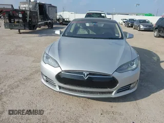 2013 Tesla Model S with VIN 5YJSA1CG3DFP28908, listed as a IAAI auction lot 41804041 with 140,756 mi miles and . Bid and sale history available at DreamBid. Image 6.