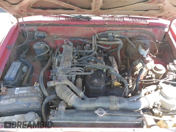 1992 Toyota Pickup DLX z VIN JT4RN82P8N5056666, wystawiony jako IAAI lot #42320829 z przebiegiem 147 032 mil mil oraz . Historia ofert i sprzedaży dostępna na DreamBid. Obrazek 10.