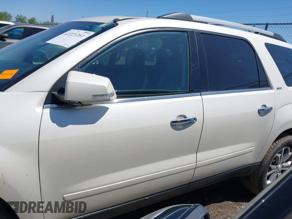 2014 GMC Acadia SLT z VIN 1GKKRRKD3EJ219690, wystawiony jako IAAI lot #42221261 z przebiegiem 103 675 mil mil oraz . Historia ofert i sprzedaży dostępna na DreamBid. Obrazek 15.